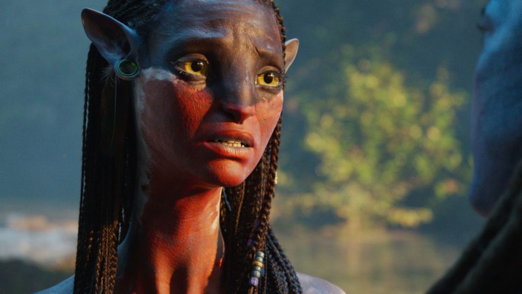 After becoming the highest-grossing actor in cinema history, Zoe Saldaña thanks James Cameron, James Gunn, and more in touching message Zoe Saldaña as Neytiri in Avatar: Fire and Ash