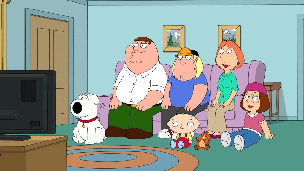 How to watch Family Guy Season 24 when the Griffins return this weekend Family Guy characters sitting on a couch and watching TV in a screenshot from the show