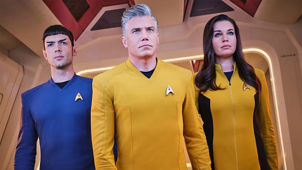 Ethan Peck as Spock, Anson Mount as Captain Pike, and Rebecca Romijn as Number One in Star Trek: Strange New Worlds