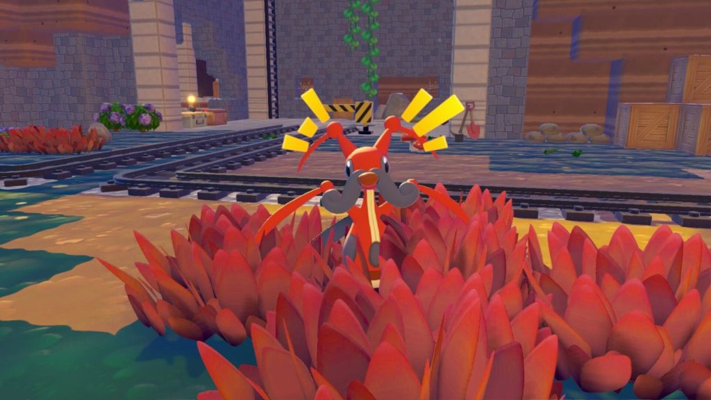 Kricketune surprised in some red grass in Pokemon Pokopia