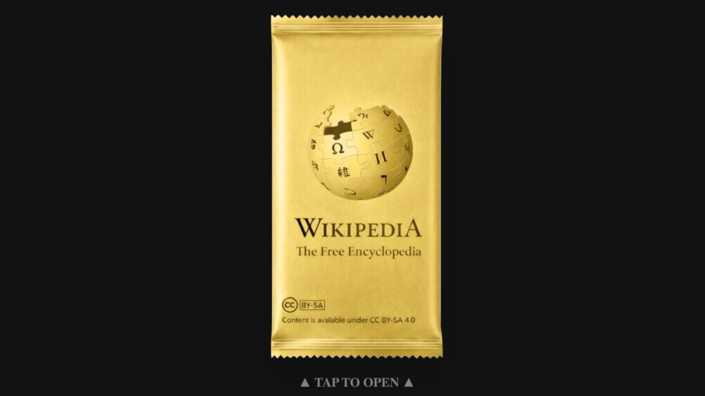 A screenshot of Wikigacha.com shows a golden pack of cards with the Wikipedia logo on them.