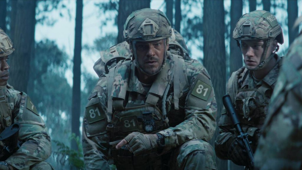 Alan Ritchson as 81 in War Machine