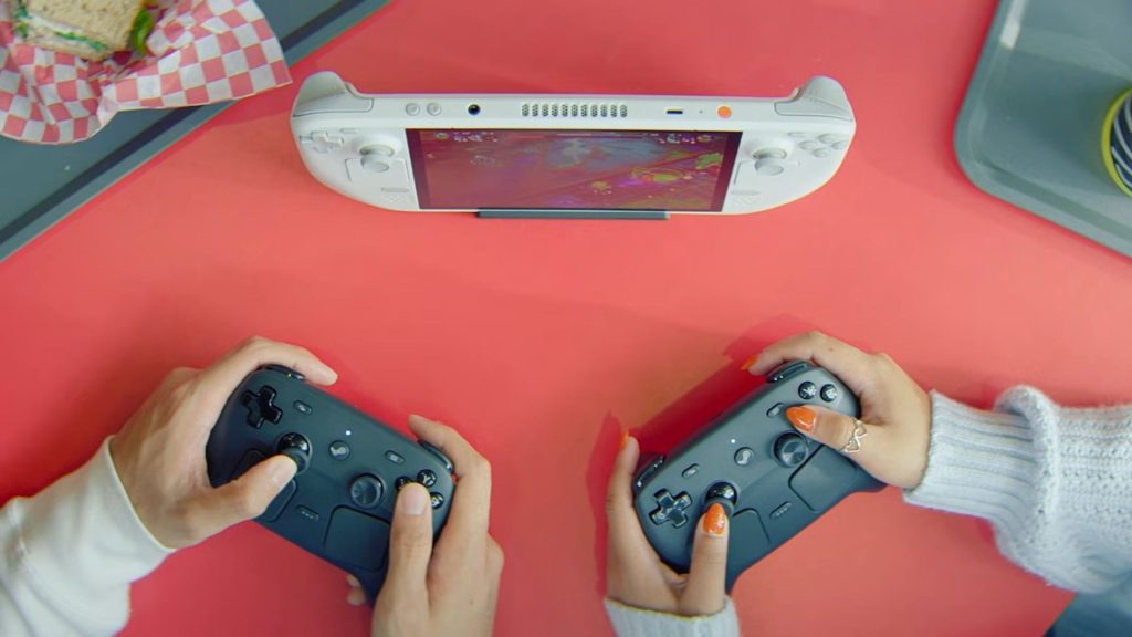 Two players using the Steam Controller with a white steam deck