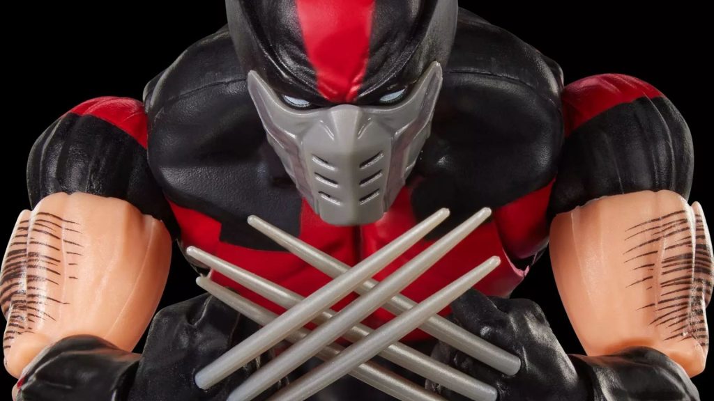 Marvel Legends Ultimate Wolverine crosses his claws while standing against a dark background