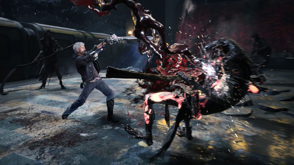 Devil May Cry 5 screenshot showing nero fighting a demon
