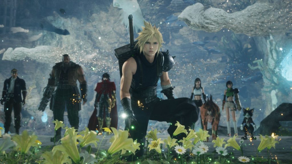 Cloud kneels before some yellow flowers while companions Barret, Tifa, Red XIII, Cait Sith, Yuffie, Vincent Valentine, and Cid watch in the background in Final Fantasy 7 Revelation