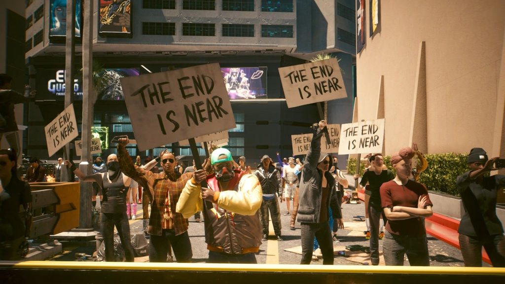 A group of protesters show up in Cyberpunk 2077 with signs saying "the end is near"