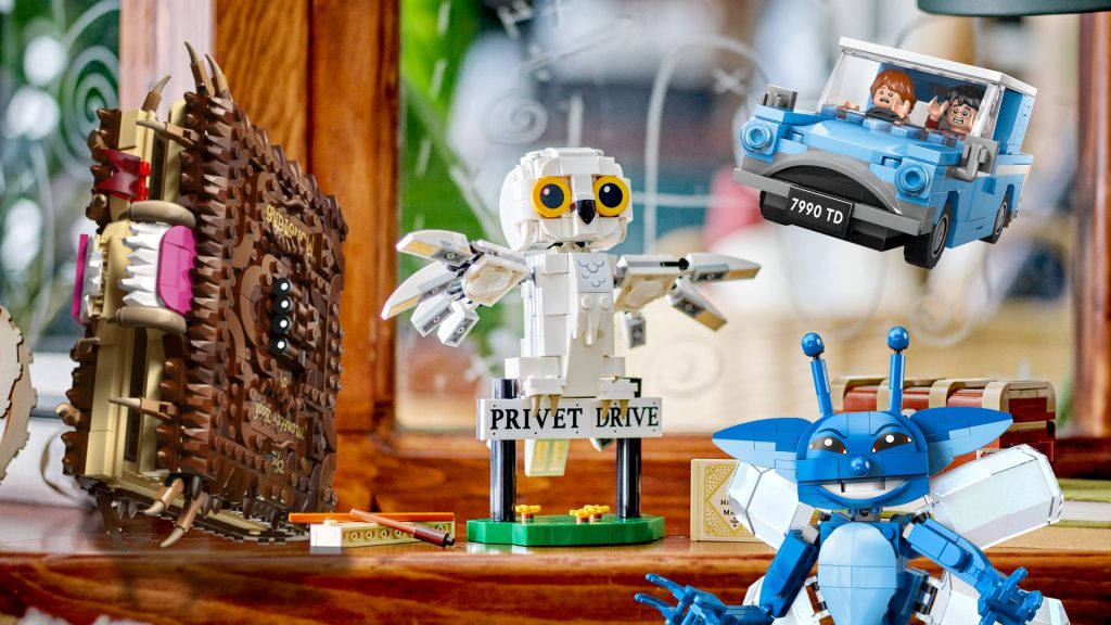 I think someone cast a spell on the best Lego Harry Potter sets, because you can save up to 33% right now Lego Monster Book of Monsters, Hedwig, Ford Anglia, and Cornish Pixie on a wooden classroom background