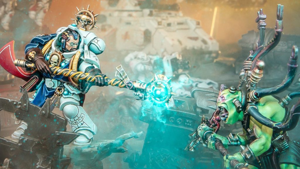 A Space Marine Librarian fires magic at an Ork Weirdboy