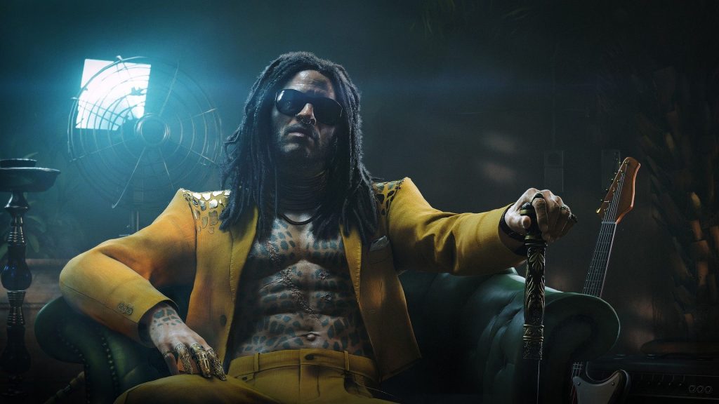 The villainous Bawma reclines in a chair, wearing a yellow suit with a nearby cane and guitar, in 007 First Light (portayed by Lenny Kravitz)