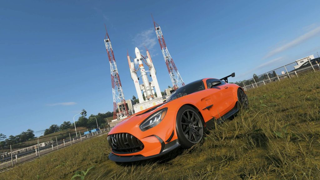 Forza Horizon 6 Space Port Photo Challenge location Forza Horizon 6 astrotoy photo challenge orange mercedes track toy car in front of rocket launch facility